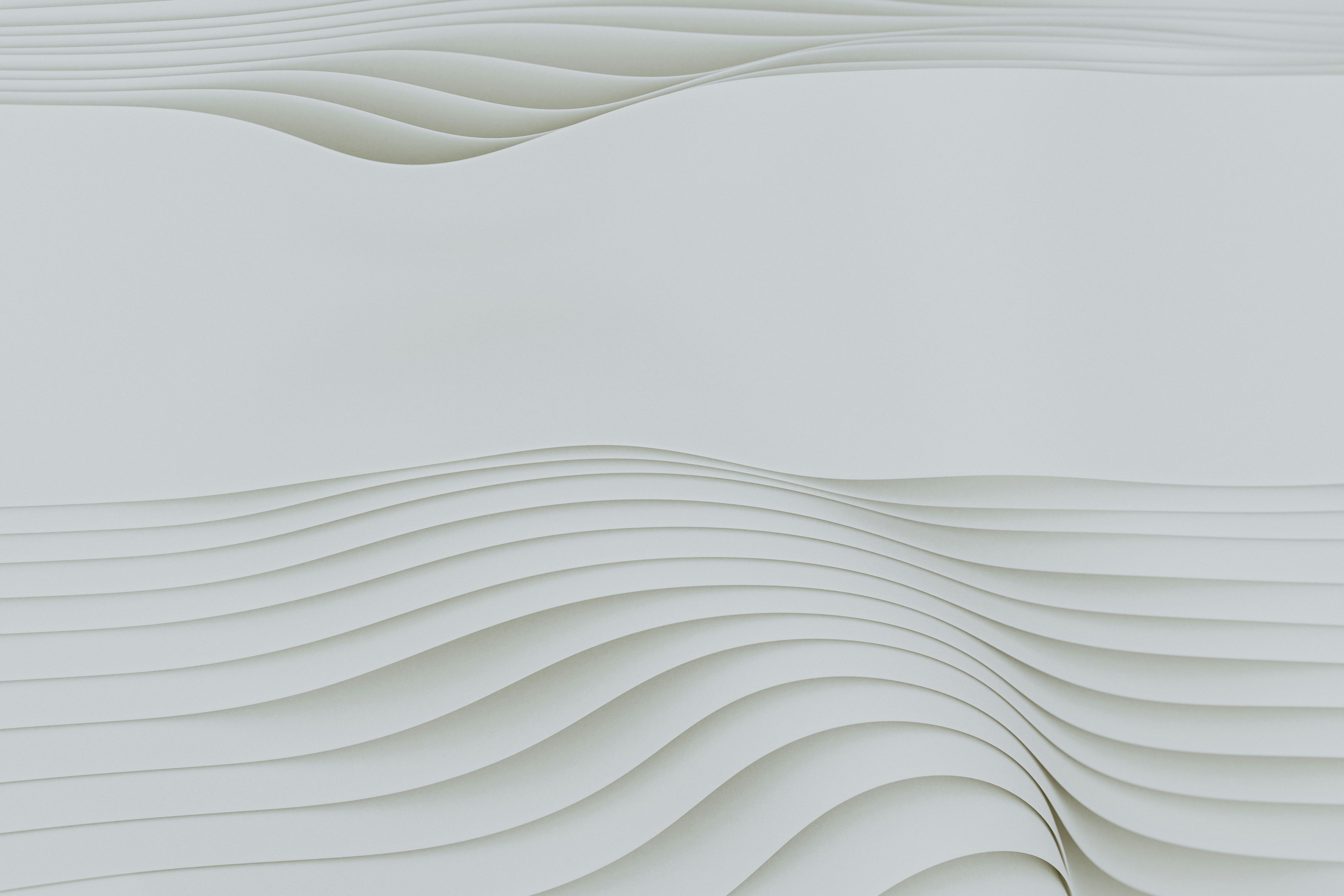 Abstract white wavy lines form a minimalist background.